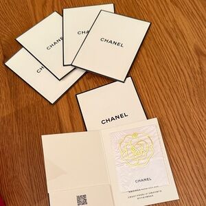 Chanel set of 5 Camellia bookmarks.